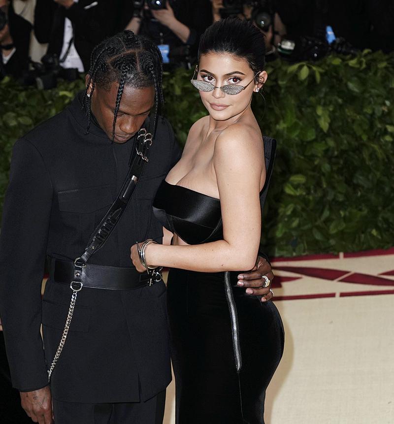 Kylie Jenner and Travis Scott at 2018 Met Gala celebrating the exhibition 'Heavenly Bodies: Fashion and the Catholic Imagination' at the Metropolitan Museum of Art in New York