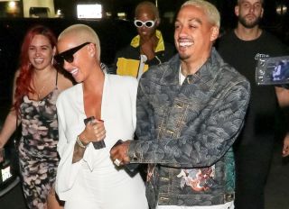 Amber Rose and boyfriend Alexander Edwards hold hands as they head to the Delilah club to party in West Hollywood, Los Angeles, CA.