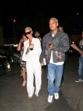 Amber Rose and boyfriend Alexander Edwards hold hands as they head to the Delilah club to party in West Hollywood, Los Angeles, CA.