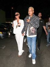 Amber Rose and boyfriend Alexander Edwards hold hands as they head to the Delilah club to party in West Hollywood, Los Angeles, CA.