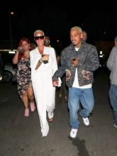 Amber Rose and boyfriend Alexander Edwards hold hands as they head to the Delilah club to party in West Hollywood, Los Angeles, CA.