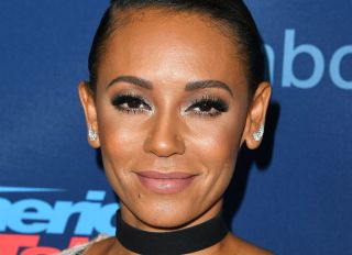 mel b keeps surgically removed tattoo in a jar