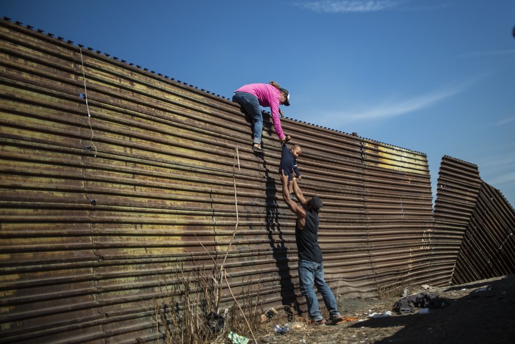 Migrants Attempt To Cross U.S. Border