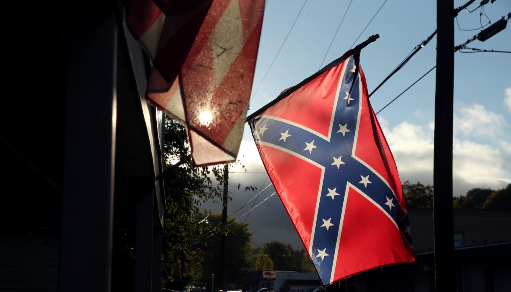guy gets fired for wearing confederate flag and noose to polls