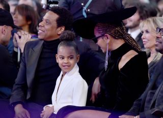 NEW YORK, NY - JANUARY 28: Recording artist Jay Z, daughter Blue Ivy Carter and recording artist Beyonce attend the 60th Annual GRAMMY Awards at Madison Square Garden on January 28, 2018 in New York City.