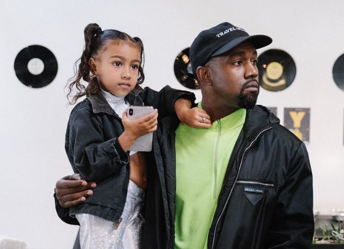 Kanye West and Daughter North West At Stashed SF sneaker store with Steve Stoute