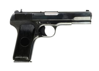 Close-Up Of Gun On White Background