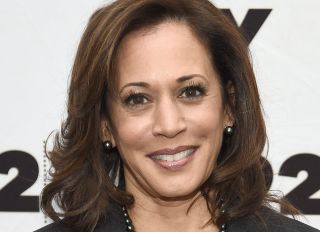Protester Rushes Stage & Grabs Mic From Kamala Harris