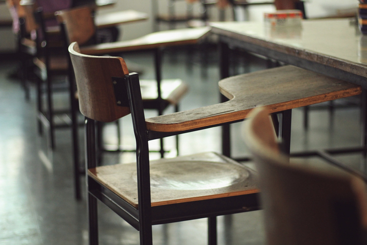 Empty Chairs With And Table In Classroom