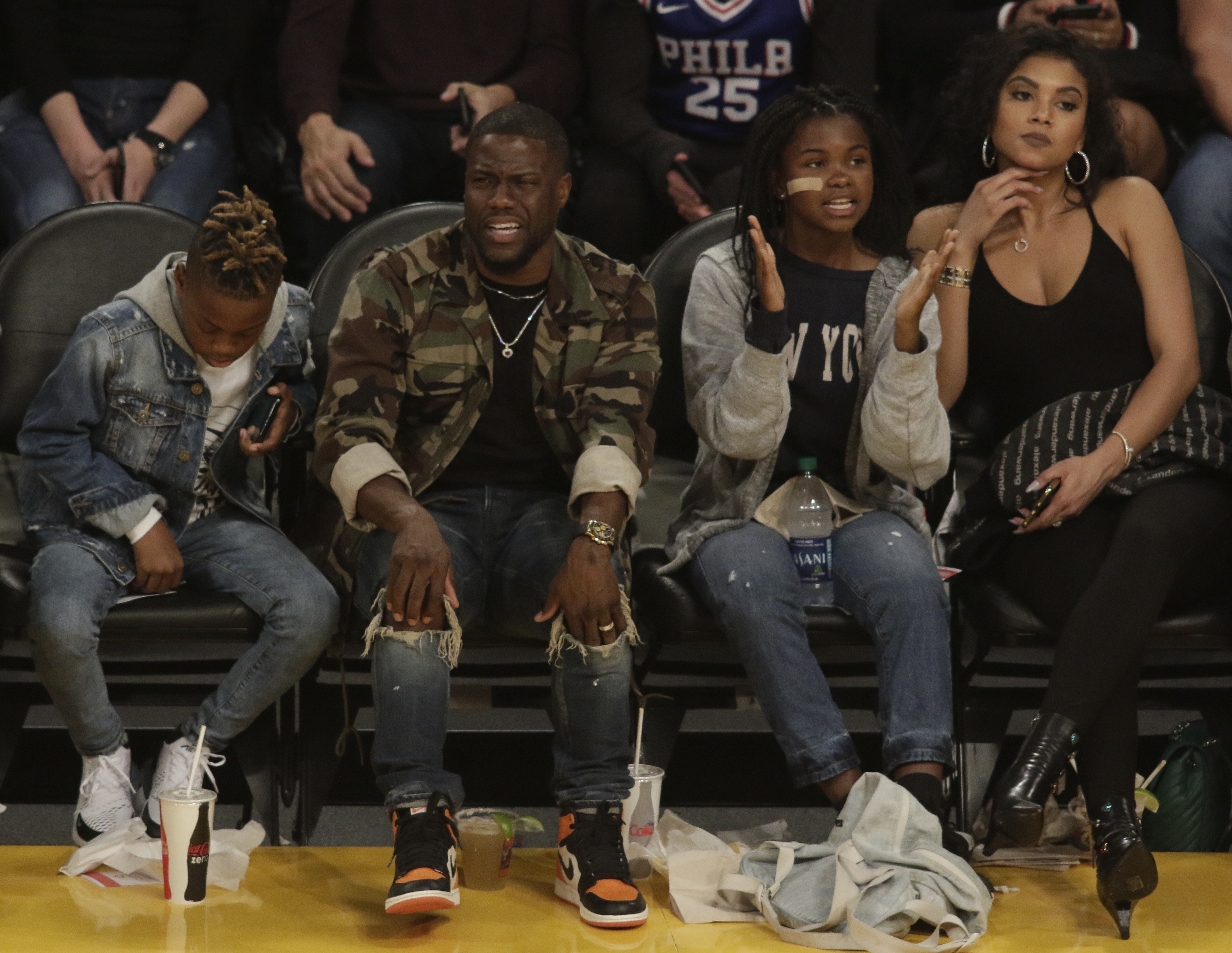 Vintage photos of celebrities courtside at Lakers games