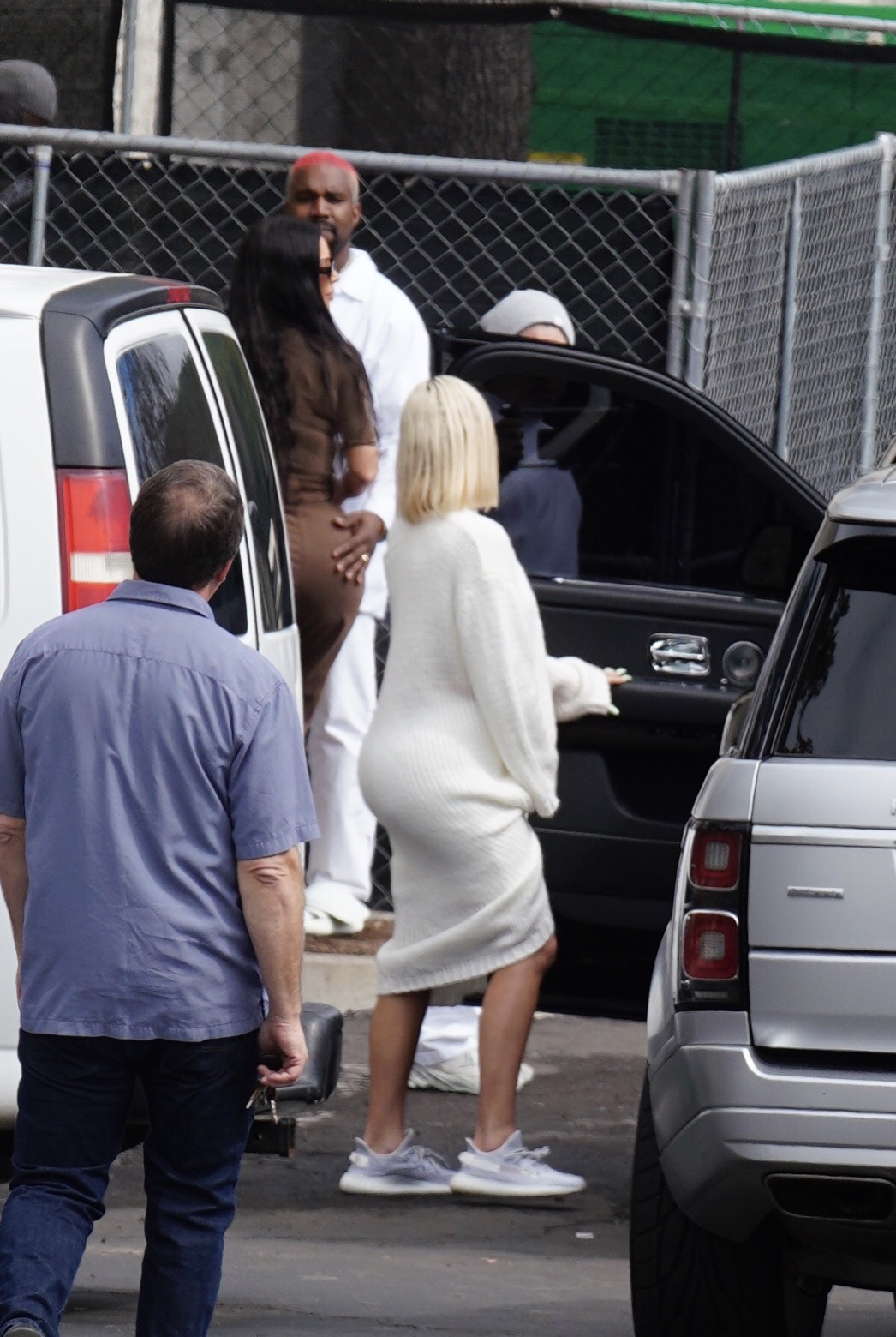 Kanye West Kim Kardashian Kourtney Kardashian and Khloe Kardashian leave his Sunday Service