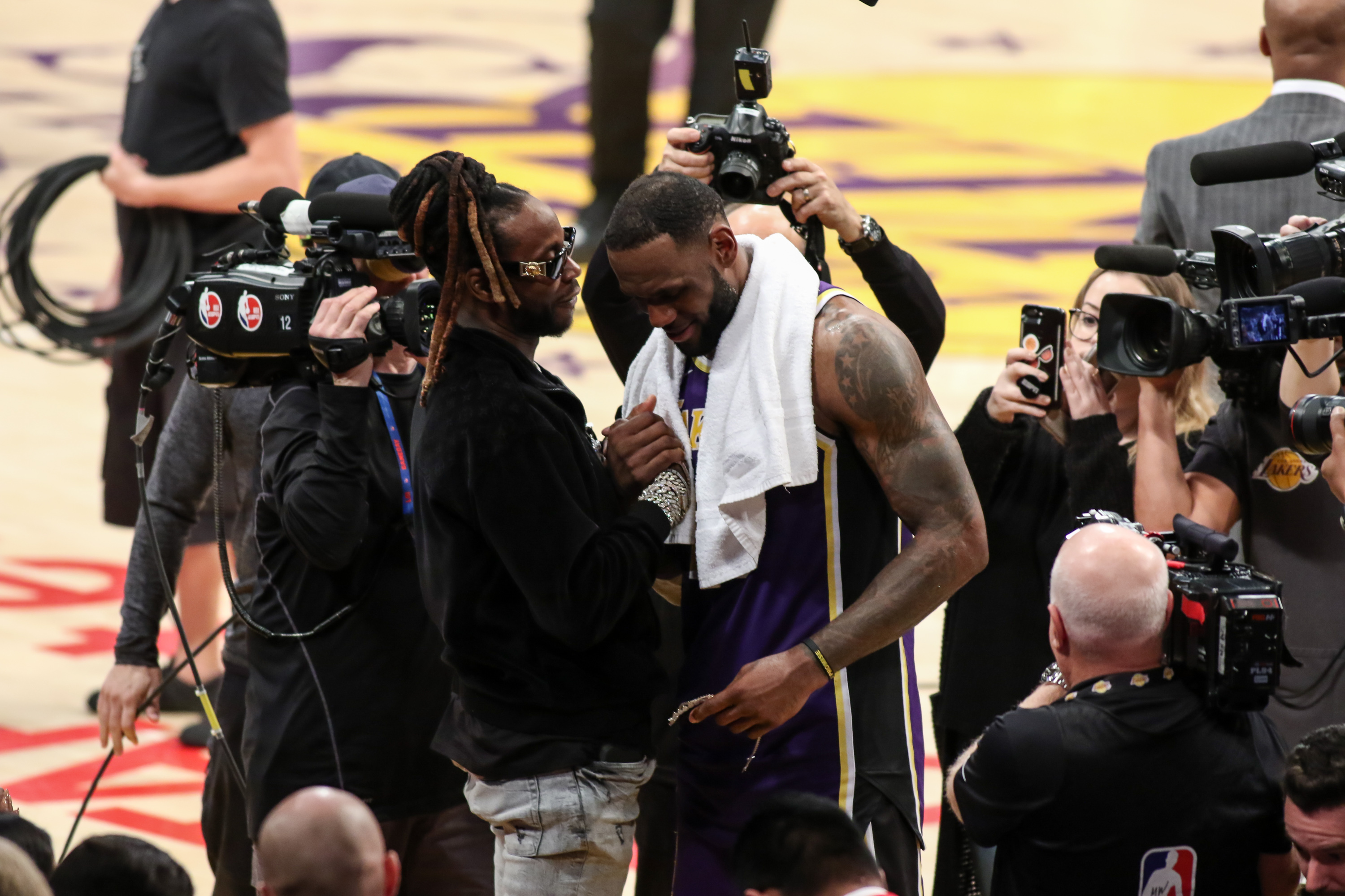 2 Chainz Gifts LeBron James With A Chain