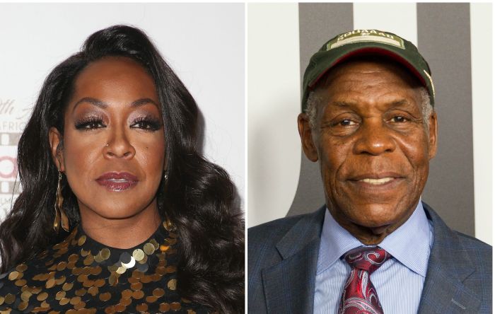 Danny Glover and Tichina Arnold side-by-side