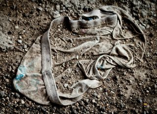 High Angle View Of Dirty Underwear On Dirt