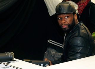 50 Cent Visits Wine N Liqour Outlet