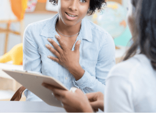black woman talk to principal