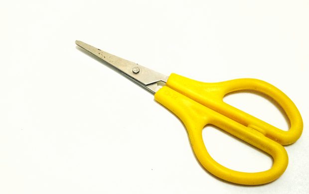Yellow Scissor in White Background