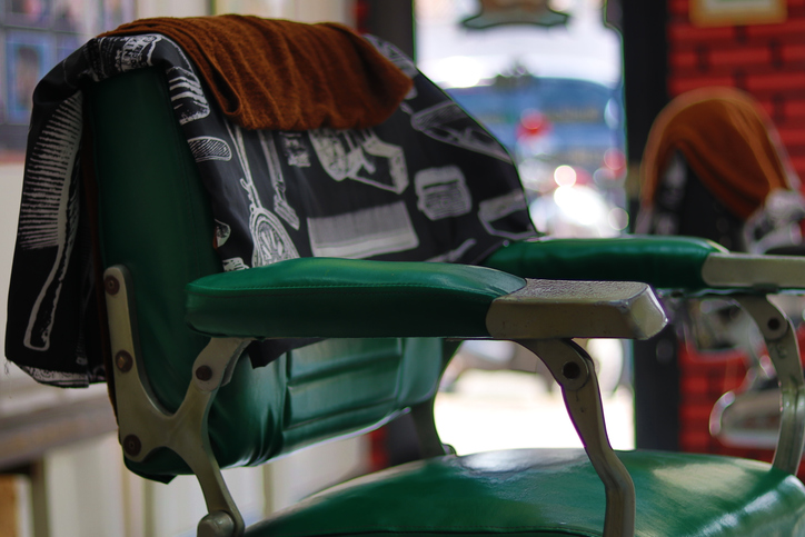 Close-Up Of Empty Chair In Barber Shop