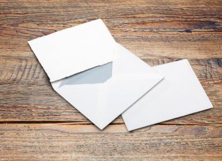 Blank Letter and envelope on wooden table