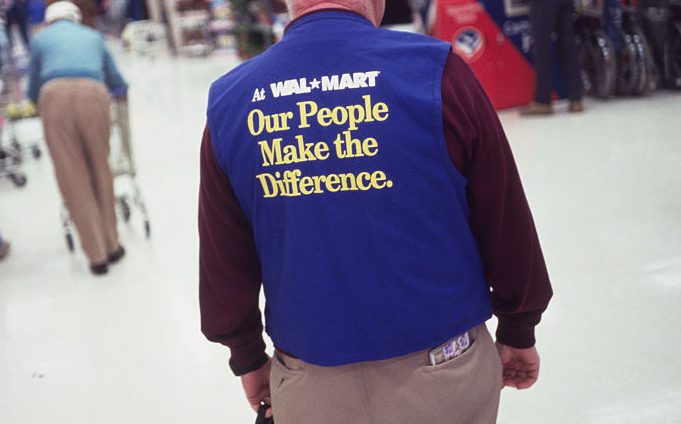 Wal Mart Employee Wearing Inspirational Slogan