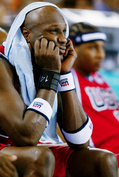 Lamar Odom of the U.S. watches gloomily from the bench at th