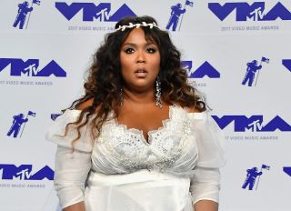 Lizzo Accuses A "Bigoted Security Guard" Of Attacking Her Hair Stylist And Stylist