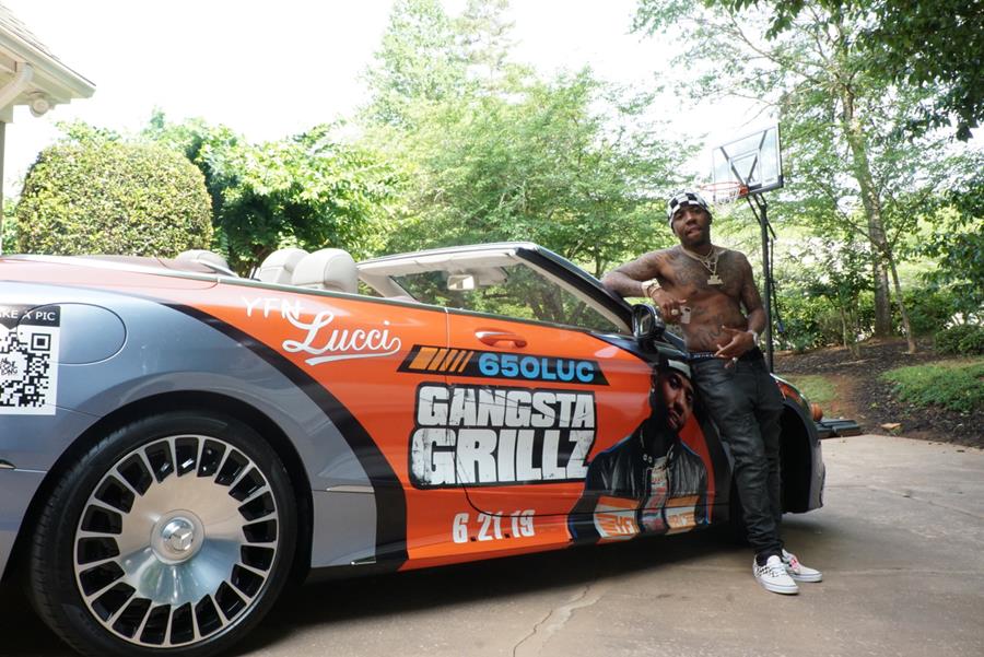 YFN Lucci puts mixtape artwork on his Maybach