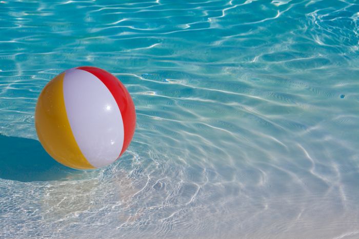 High Angle View Of Beach Ball In Swimming Pool
