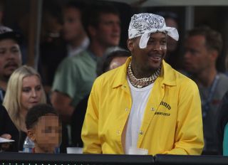 YG watches the Rams play