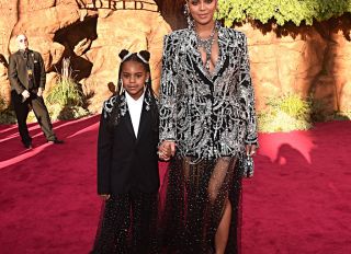 Blue Ivy Carter (L) and Beyonce Knowles-Carter attend the World Premiere of Disney's "THE LION KING"