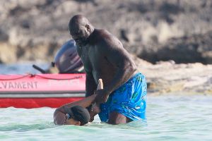 Shaquille O'Neal goes swimming in Formentera, Spain with new girlfriend