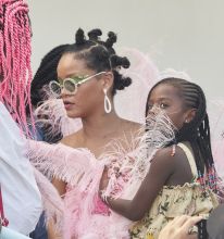 Rihanna wears pink feathered costume to Cropover