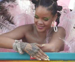 Rihanna wears pink feathered costume to Cropover