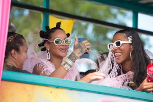 Rihanna wears pink feathered costume to Cropover