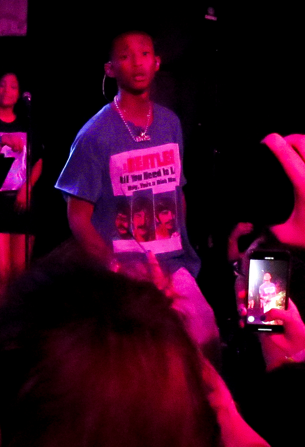 Jaden Smith surprises fans as he jumps up on stage with Willow Smith during her performance at The Roxy