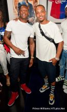 Girvan "Fly" Henry, T.I. unveils Nipsey Hussle installation