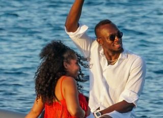 Usain Bolt and girlfriend Kasi J. Bennett vacation in Ibiza, Spain