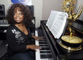 Katreese Barnes tickles the ivories in her E. 90th St. apart