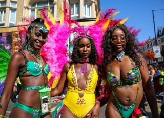 Dancers in colourful costumes during the 2019 Notting Hill...