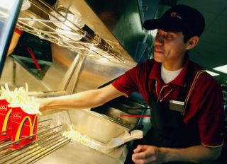 McDonald's Reports Second Quarter Earnings and Record Sales Reflecting Revitalization Progress