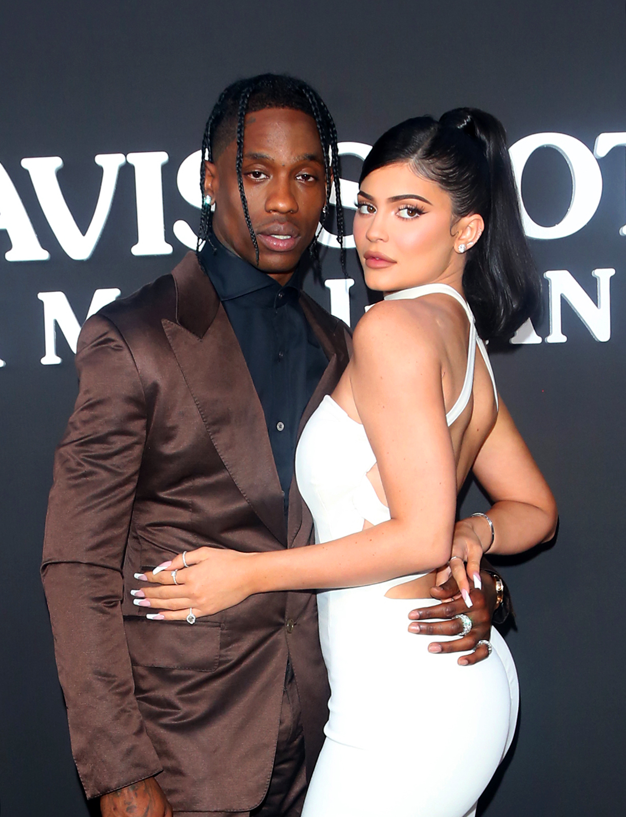 Kylie Jenner shows legs in mini dress with Travis Scott