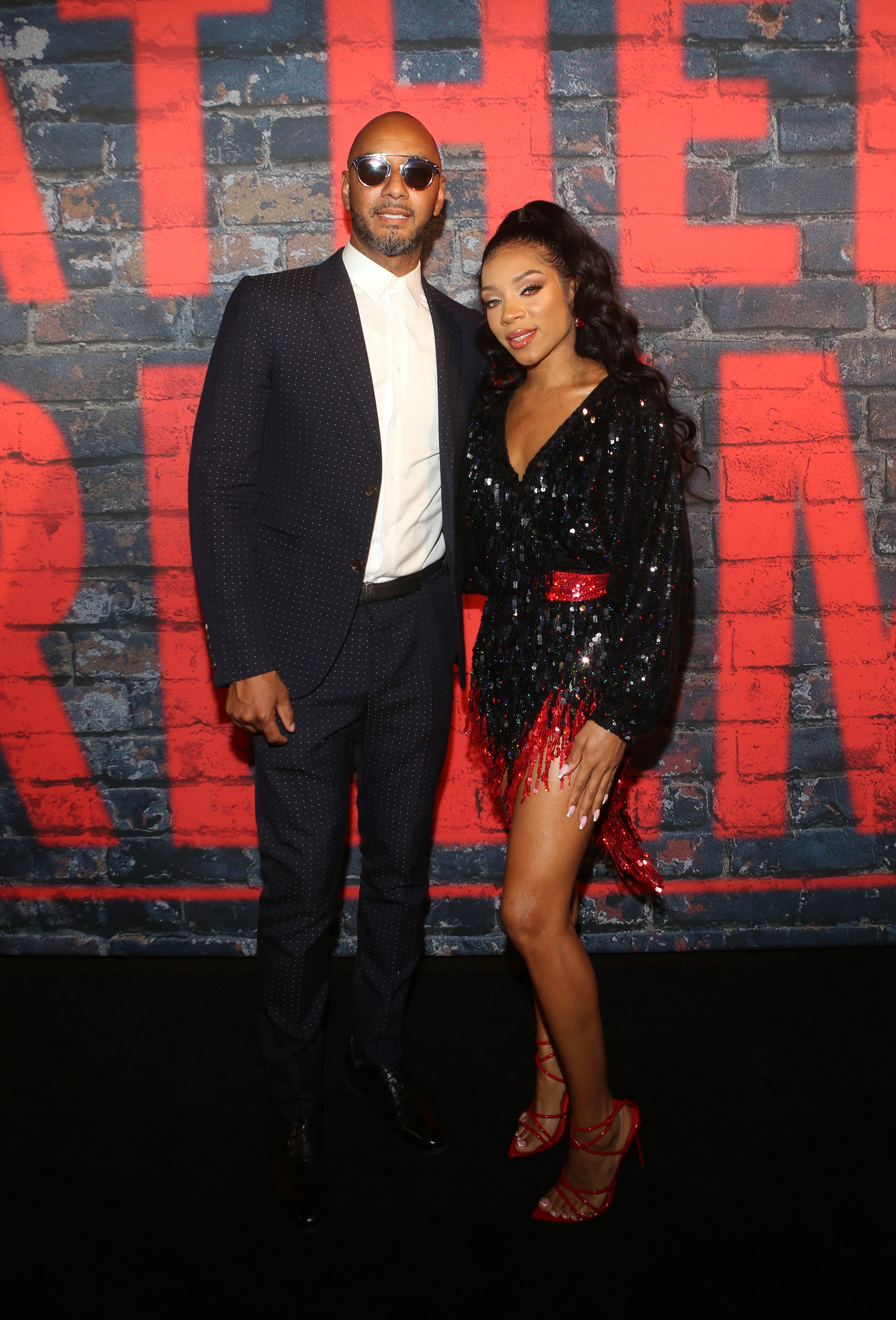 Swizz Beatz and Lil Mama at the Godfather Of Harlem Screening at the Apollo