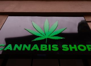 A Dr Ziolko Cannabis Shop sign is seen at the city centre...