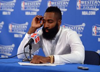Houston Rockets' James Harden (13) speaks to the media during the end of game press conference for Game 2 of the NBA Western Conference finals at Oracle Arena in Oakland, Calif., on Thursday, May 21, 2015. The Warriors defeated the Rockets 99-98. (Jose Ca