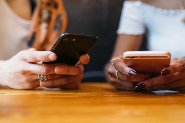 Multicultural women using smartphone