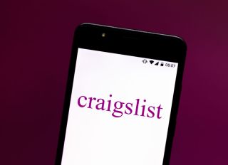 In this photo illustration a Craigslist logo seen displayed...