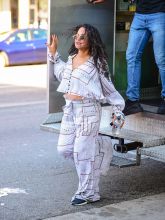 Pregnant Christina Milian wears a billowy maternity set