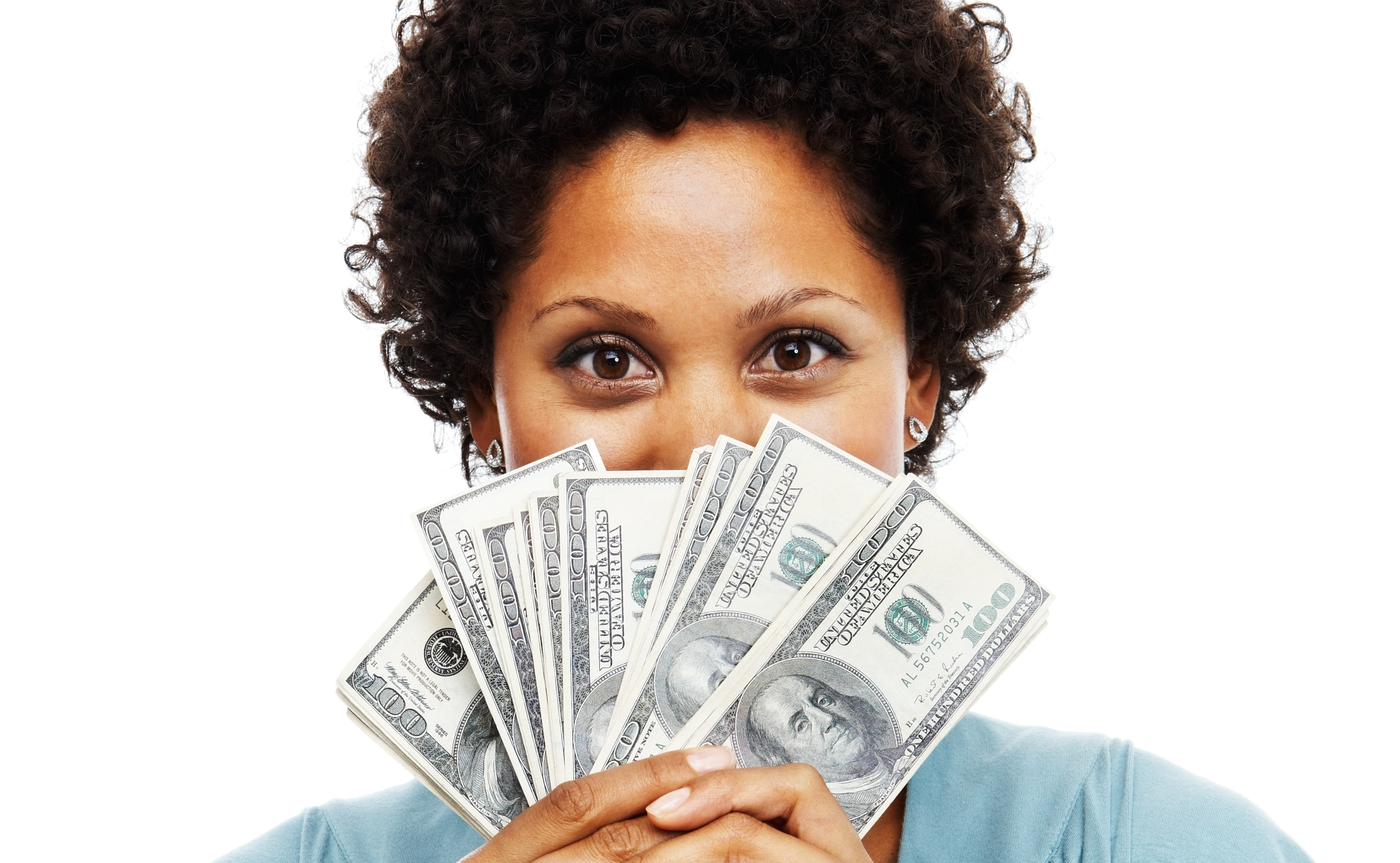 Portrait of an African woman holding US paper currency - stock photo
