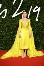 Emelia Clarke attends the Fashion Awards 2019