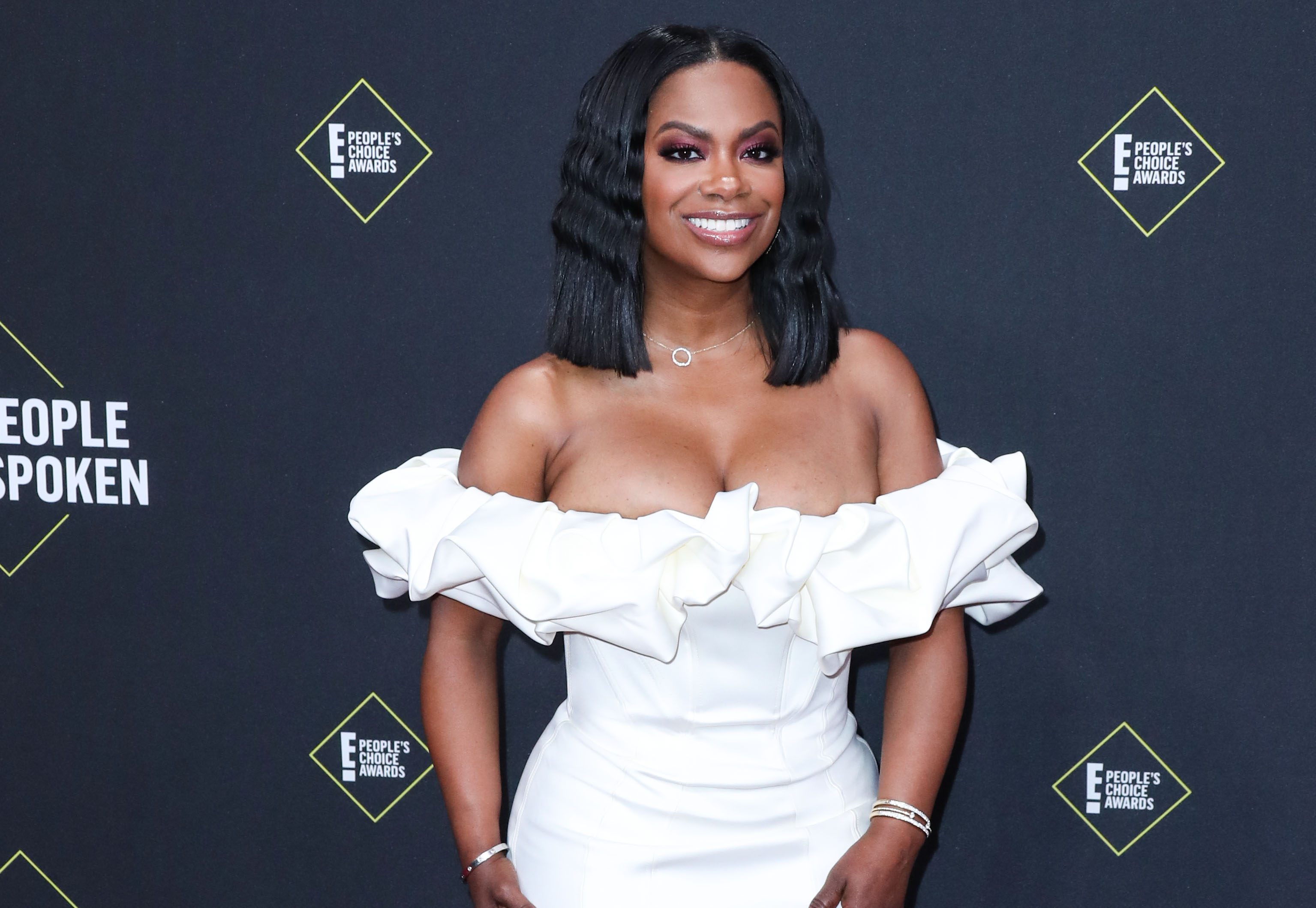 Actress Kandi Burruss wearing House Of Cb arrives at the 2019 E! People's Choice Awards held at Barker Hangar on November 10, 2019 in Santa Monica, Los Angeles, California, United States.